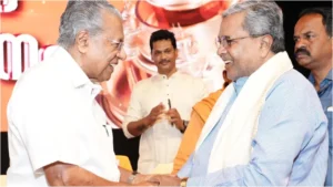 pinarayi-vijayan-shake-hand-with-siddaramaiah